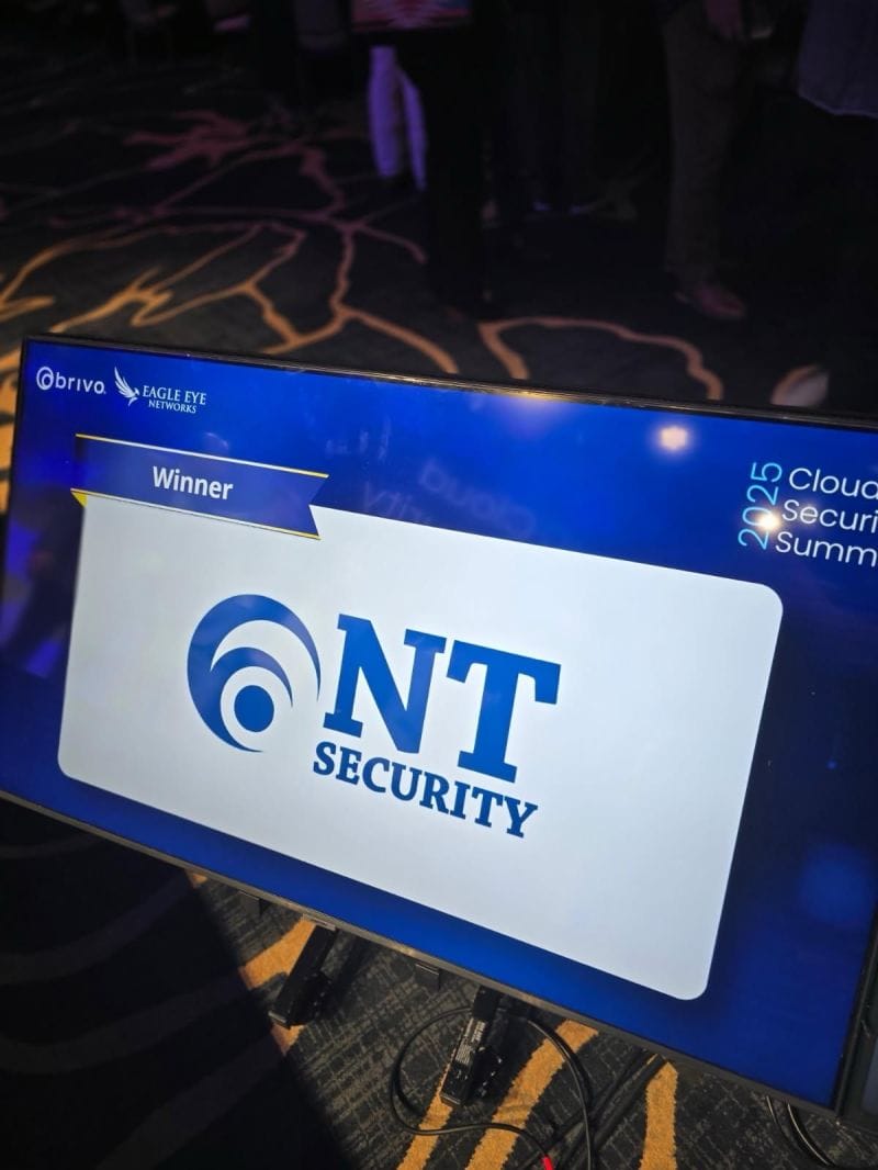 Stage monitor showing screenshot of NT Security awarded 2025 Innovator of the Year at Cloud Security Summit