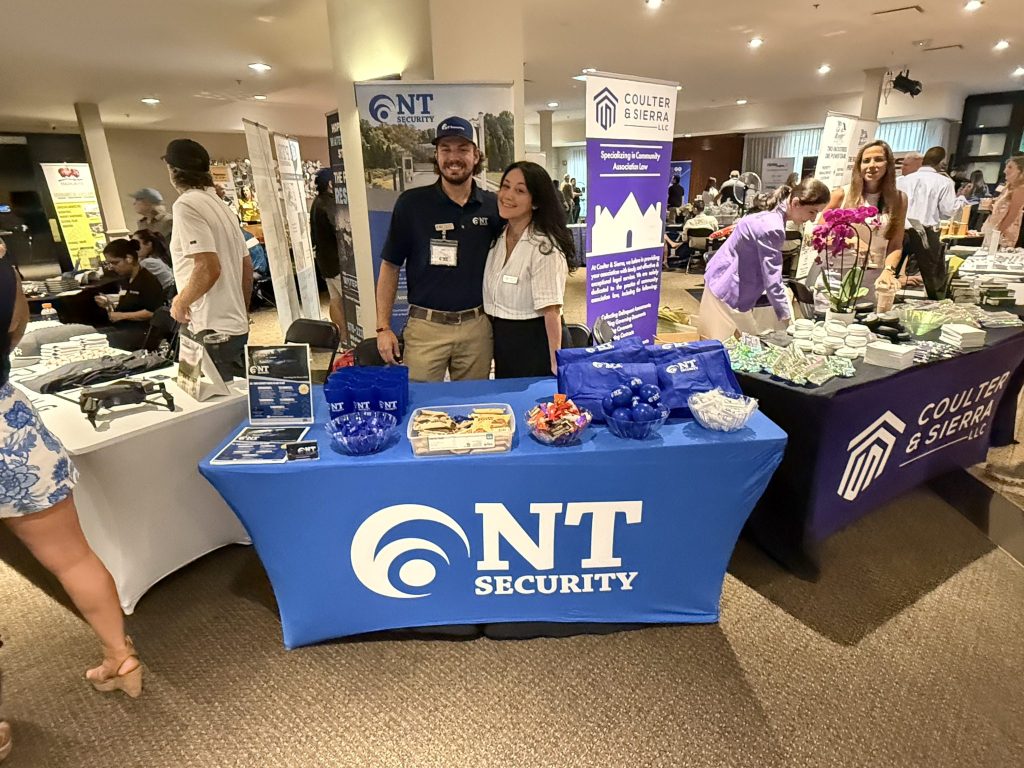 Photo of Vinny and Rachael, our NT Security team at September 2026 AMG Tradeshow