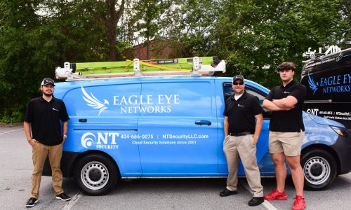 NT Security professional team of installers posing near their work van in Lilburn, GA.